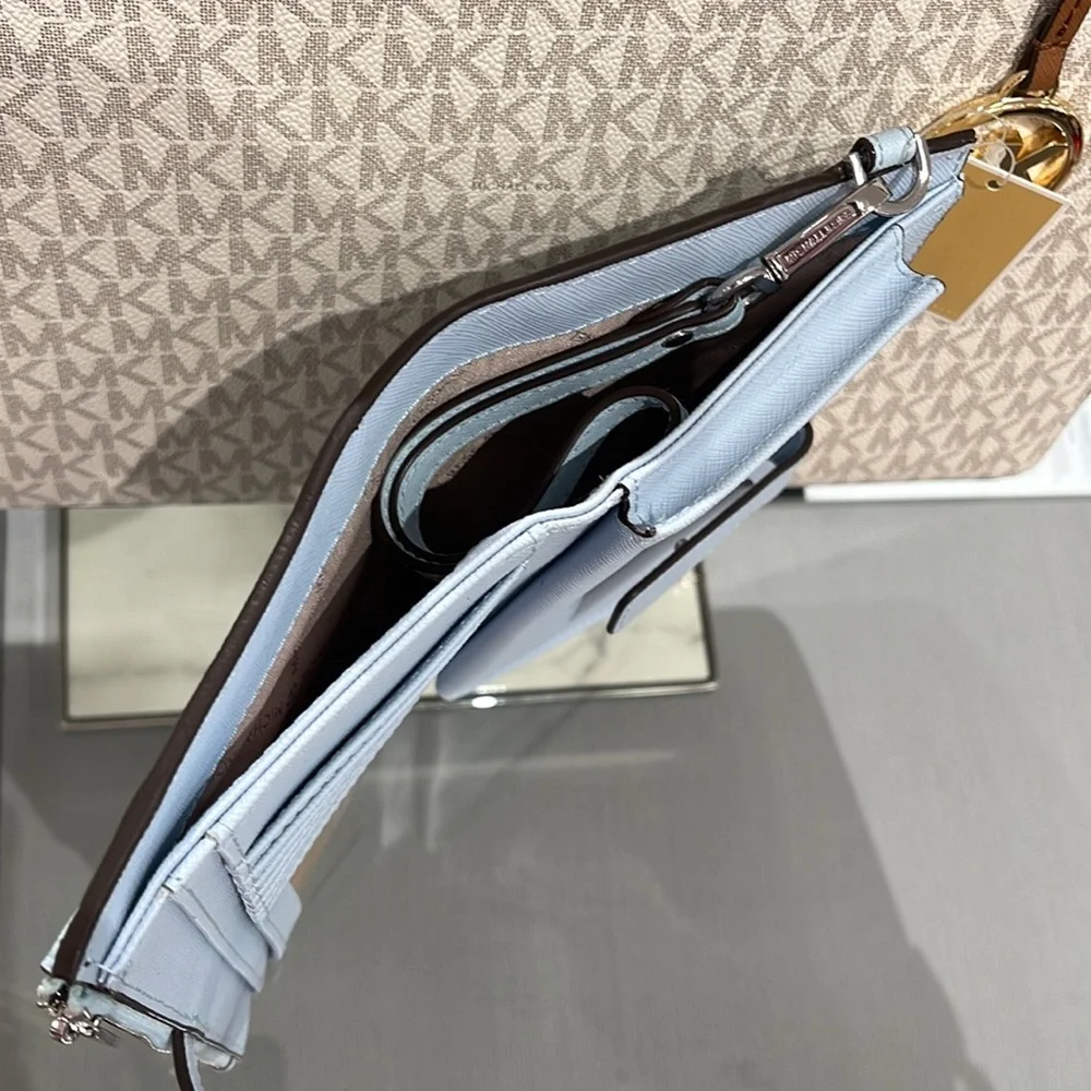 MICHAEL KORS LARGE DOUBLE ZIP WRISTLET WALLET PHONE CASE CLUTCH 
Vista Blue 
NWT - Picture 8 of 16